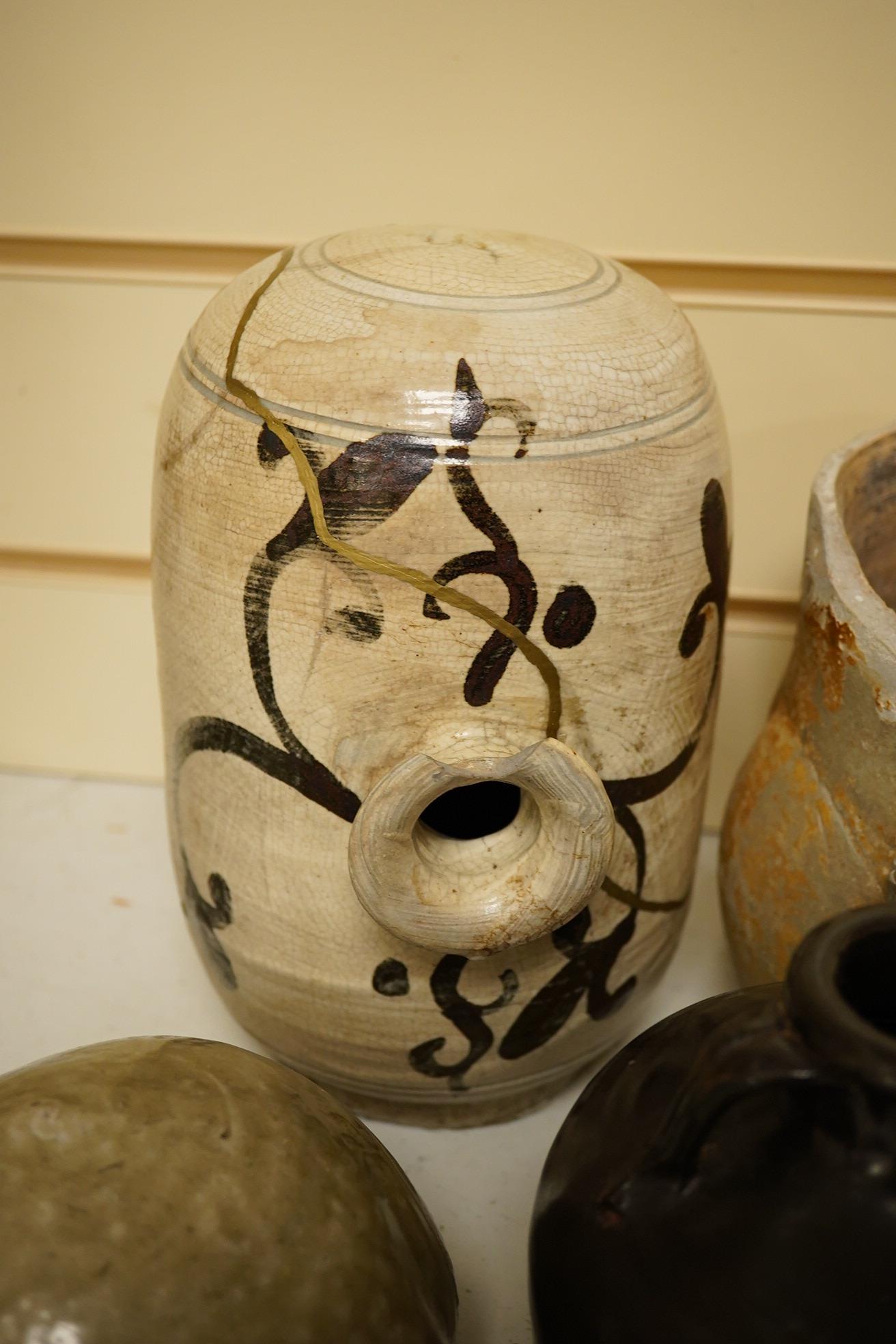 Four various Chinese stoneware vessels, tallest 22cm high. Condition - poor to fair